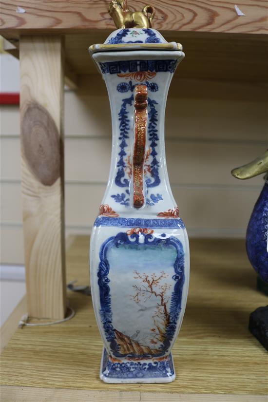 An 18th century Mandarin pattern vase, H.33cms